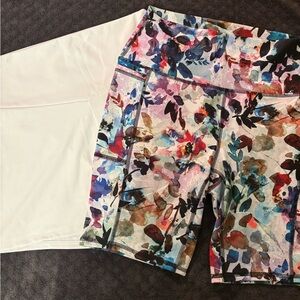 2 pair women’s size Large RBX bike shorts. 1 white and 1 floral.